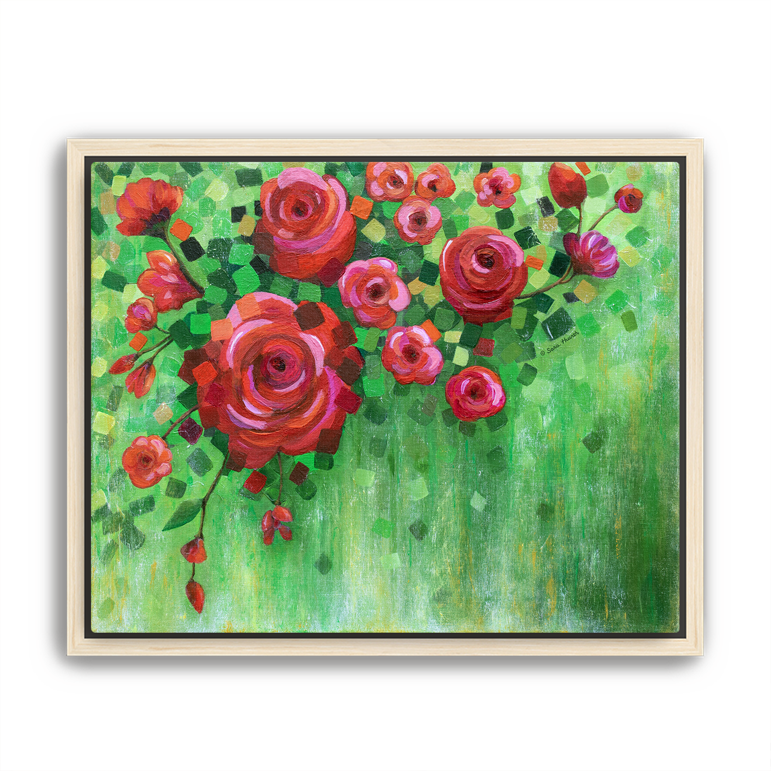 Framed artwork of red and pink flowers on a green background